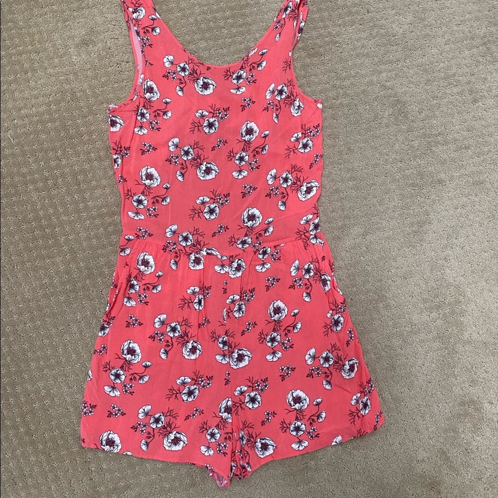 Frenchi pink floral romper with open back